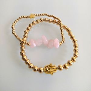 2 Bracelets natural rose stones , gold plated beads and Hasma stackable